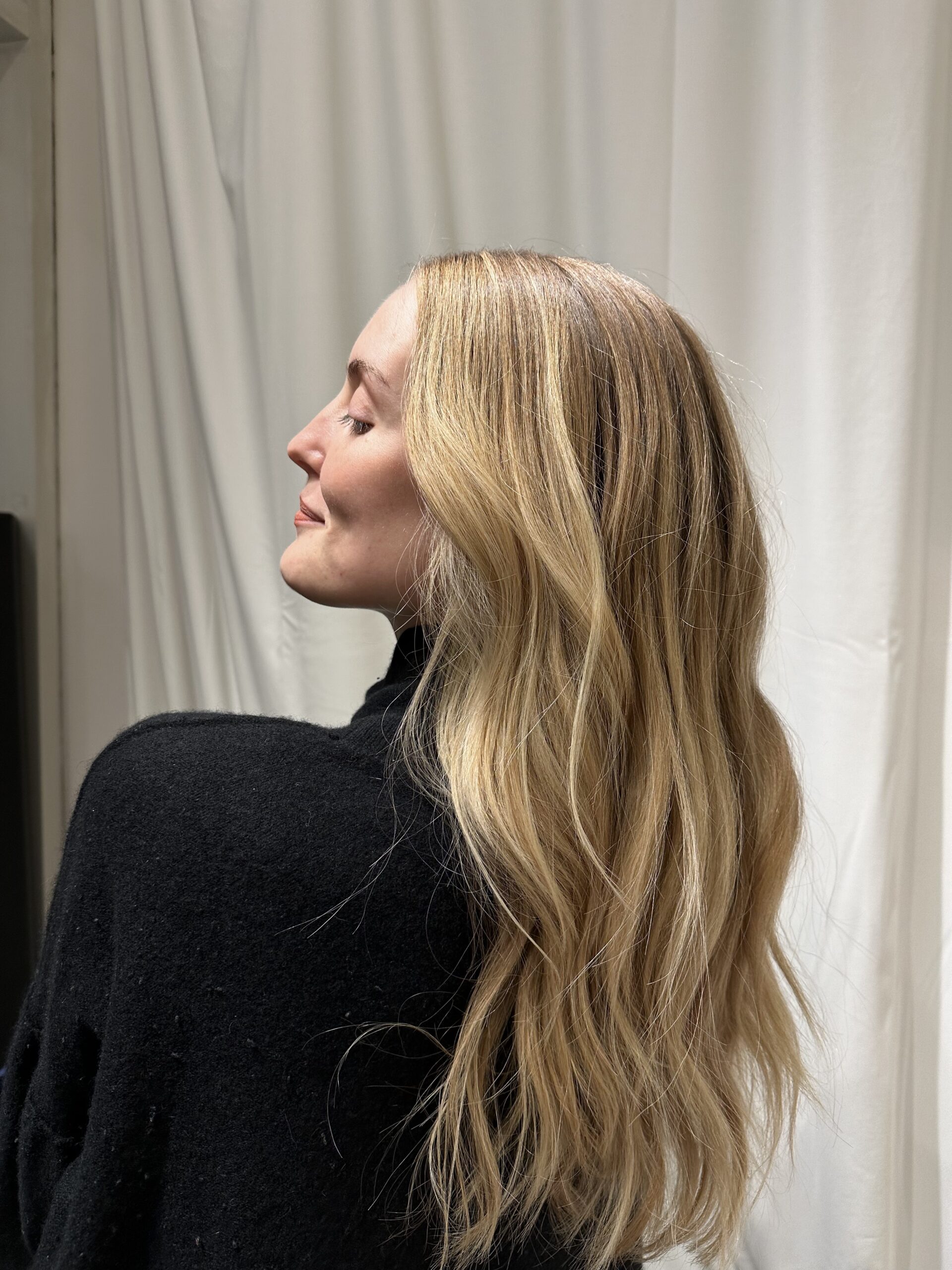 Side Profile View of Woman with Long Blonde Hair